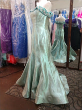 Load image into Gallery viewer, Mac Duggal ; #30577 Size 12 Color Aqua Marine ( stock image has a different hue see photos for actually dress ) ; Mac Duggal #30577 Prom dress mermaid style aqua marine ( photo is slightly darker than actual dress see added pics ) , glitter taffeta ;fabric , off the shoulder neckline with crystal beading , zipper closure. see size chart for measurements
