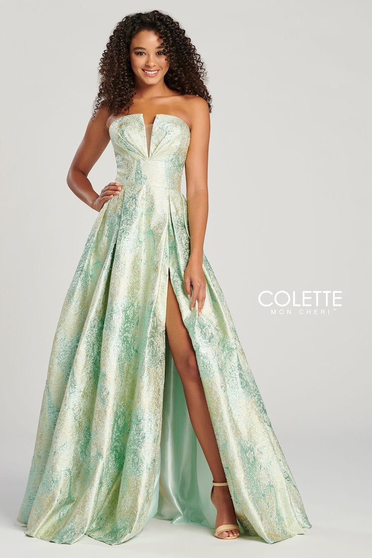 Mon Cheri by Colette #12007 Size 10 Color Mint/Gold; Prom gown Formal, Party dress  ; This astonishing dress features a strapless plunging neckline with a modest mesh insert for comfort. Showcasing its fascinating jacquard material and alluring side front slit, you're sure to have all eyes on you on your special day. DETAILS: Back Style ;Back Zipper, Corset Lace Up Detail  Jacquard fabric  Neckline ;Strapless, V Neck Style ;A Line 