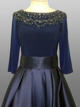 Load image into Gallery viewer, Mac Duggal #80682D Size 4 Navy This Mac Duggal #80682D couture ball gown will be the perfect dress for prom , pageant or any occasion. Jersey knit bodice with a three-quarter length sleeves with beautifully beaded neck will set you apart ,the embellished collar adding ; sparkle and glamour. 
