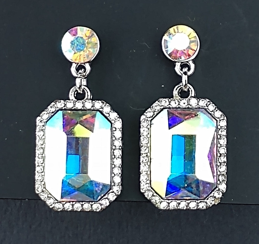 Post earrings,  semi chandelier style , rectangle faucet cut stone trimmed in crystal rhinestones adding sparkle mounted in silver lead and nickel free metal. made in china 