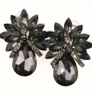 Fashion Jewelry black crystal clip earrings Clip style earrings 2" long 1 3/4 " wide Black onyx crystal, unique design includes a offset of marque with tear drop along with black crystal banding inset into the look, quality mount with silver lead and nickel free  made in china 