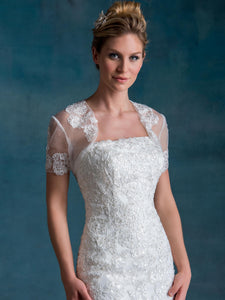 Mary's Bridal #6525 Size 8 ; Color Ivory Style: 6525 A fit and flare bridal gown featuring straight across neck line, re-embroidered lace and tulle, back with zipper closure and buttons, bolero, and court train. 