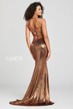 Load image into Gallery viewer, Mon Cheri by Colette #CL12046 Size 6 ; Prom dress , Party gown ,formal  Color Copper ; Colette CL12046 Prom gown this 2pc dress is Sleeveless an the fabric is ; metallic stretch lame it is a two-piece ; sheath gown with a plunging crisscross V-neck, natural waist, thigh slit and a sweep train. 
