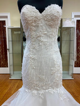 Load image into Gallery viewer, Adagio Bridal ivory wedding gown Size 6 Style : W9233 This mermaid , fit n flare gown has a lace and beaded detailed bodice ,corset back. The skirt is a full layered skirt lined with a horsehair trim, chapel length train.
